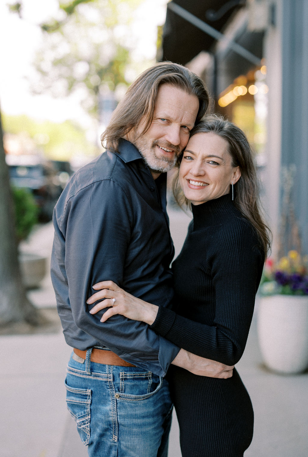 Mark Alan Sandberg and his wife Kari smiling together outdoors